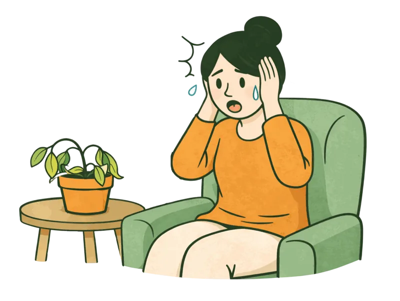 A young woman, hand on her cheek, worried in front of a wilting plant